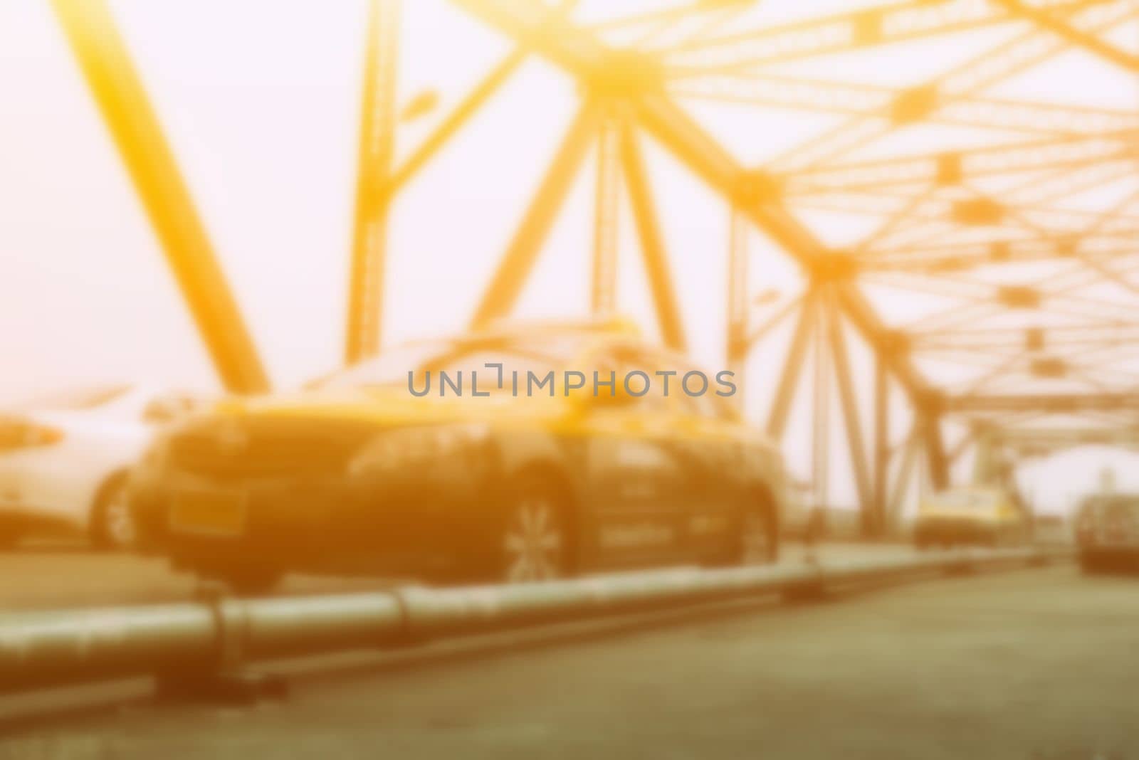 Blurred Thai Taxi on Memorial Bridge Bangkok, Thailand with Light Leak. by mesamong