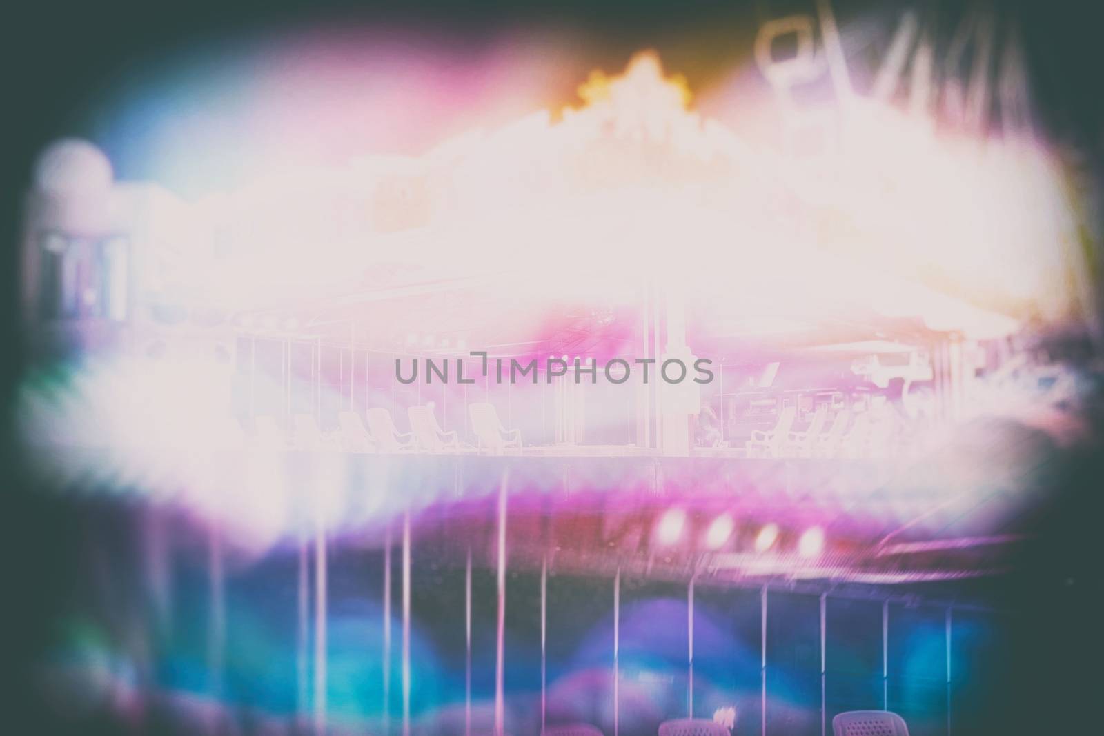 Abstract Blurred Scenery of Carnival Festival Night Background. by mesamong