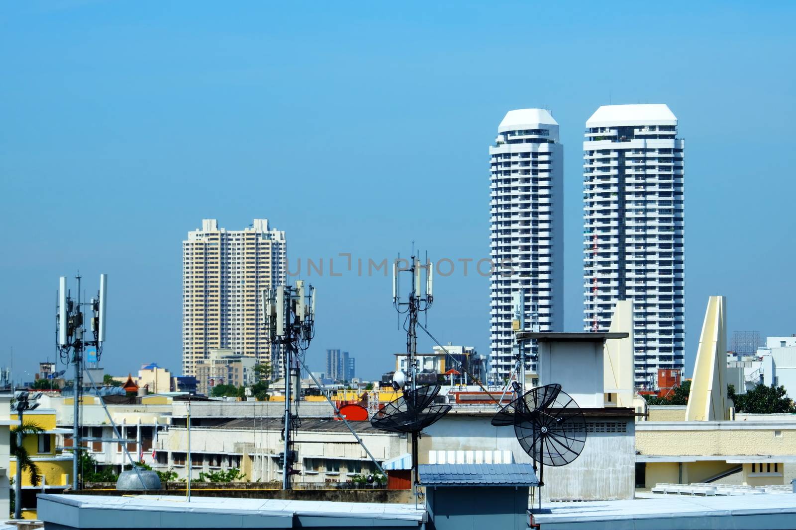 Telecom Poles and Satellites on Roofs. by mesamong