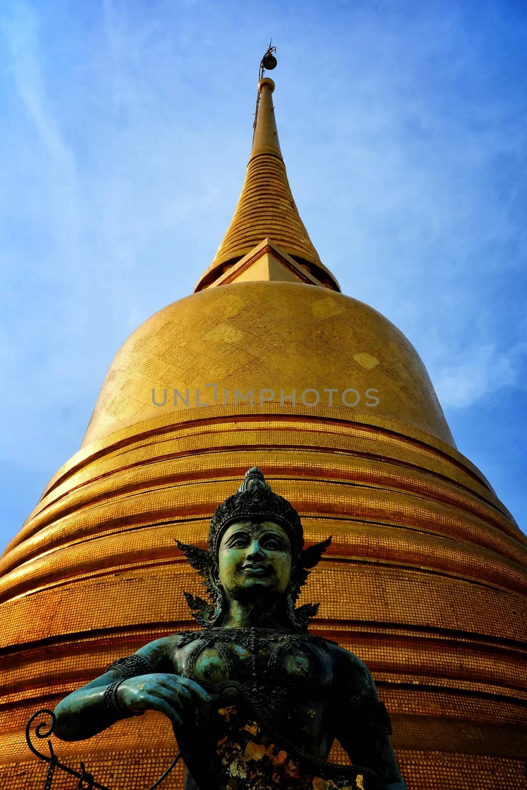 Ancient Thai Angel Statue on Temple of the Golden Mount at Wat Saket Temple Bangkok, Thailand. by mesamong