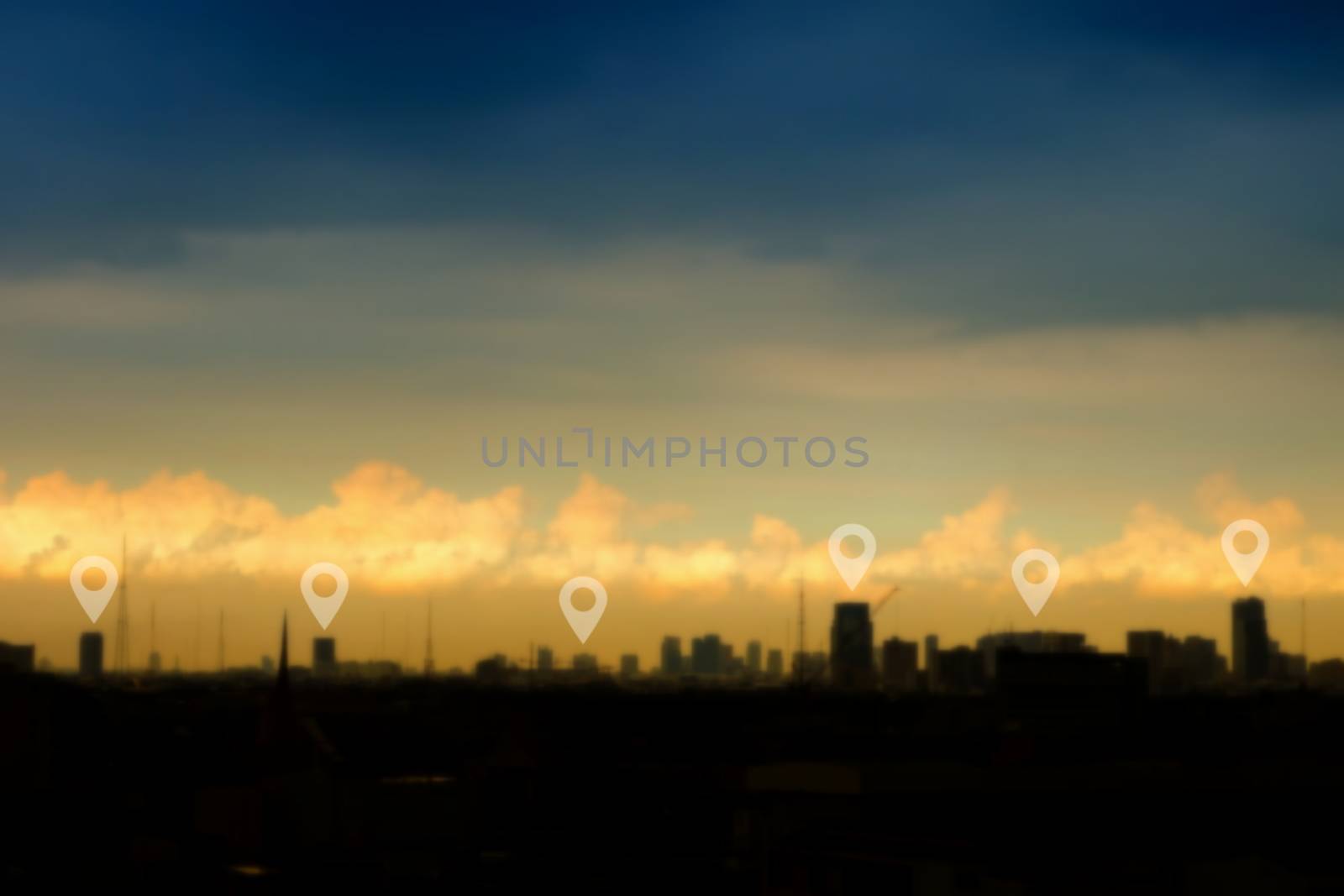 Location Pins Icon on Blurred Building with Sunset Background.