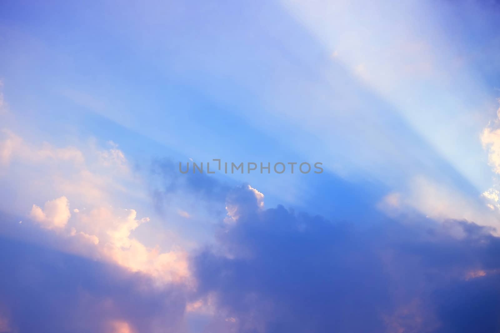 Sunlight Beam Shining Through the Heaven Blue Skies Background.