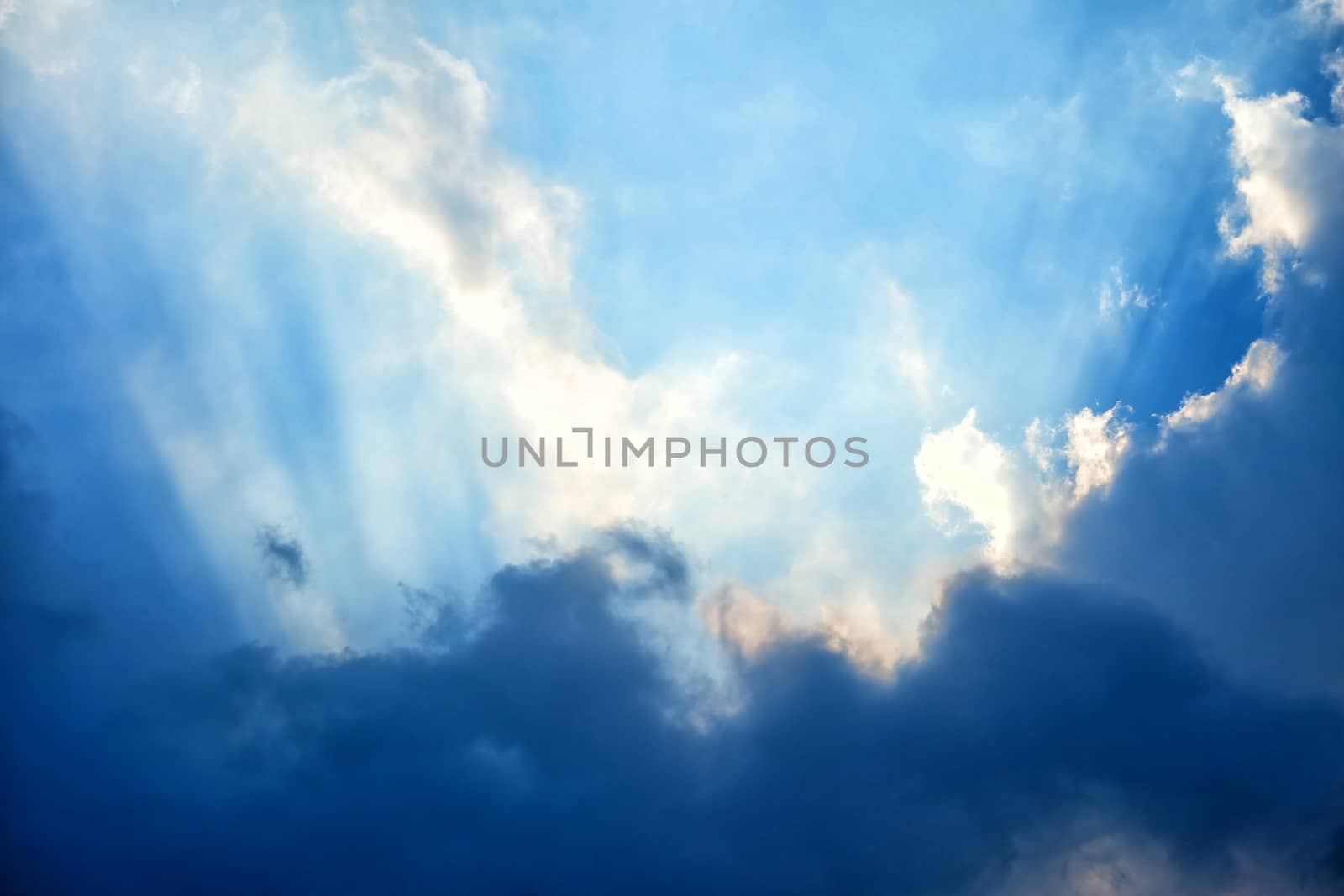 Sunlight Shining through Clouds Background.