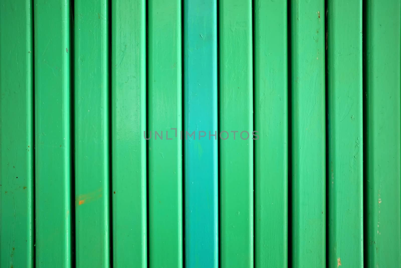 Close-up Green Folding Metal Door Background. by mesamong