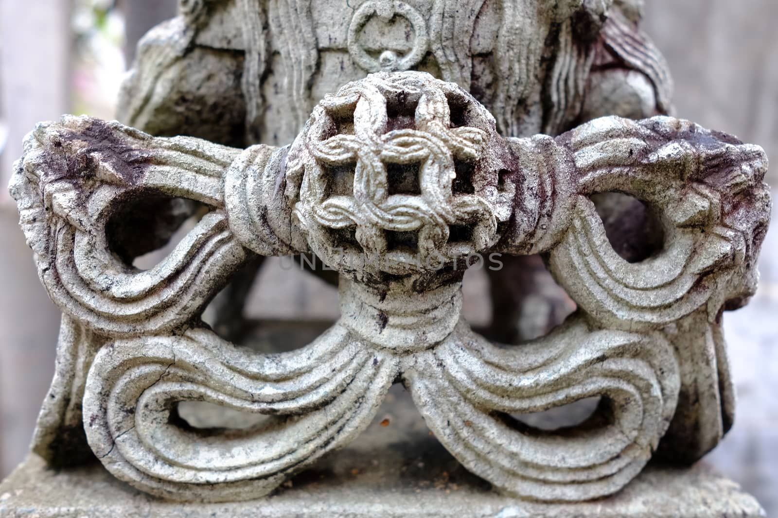 Close-up Ancient Chinese Stone Lion in front of Thai Church.