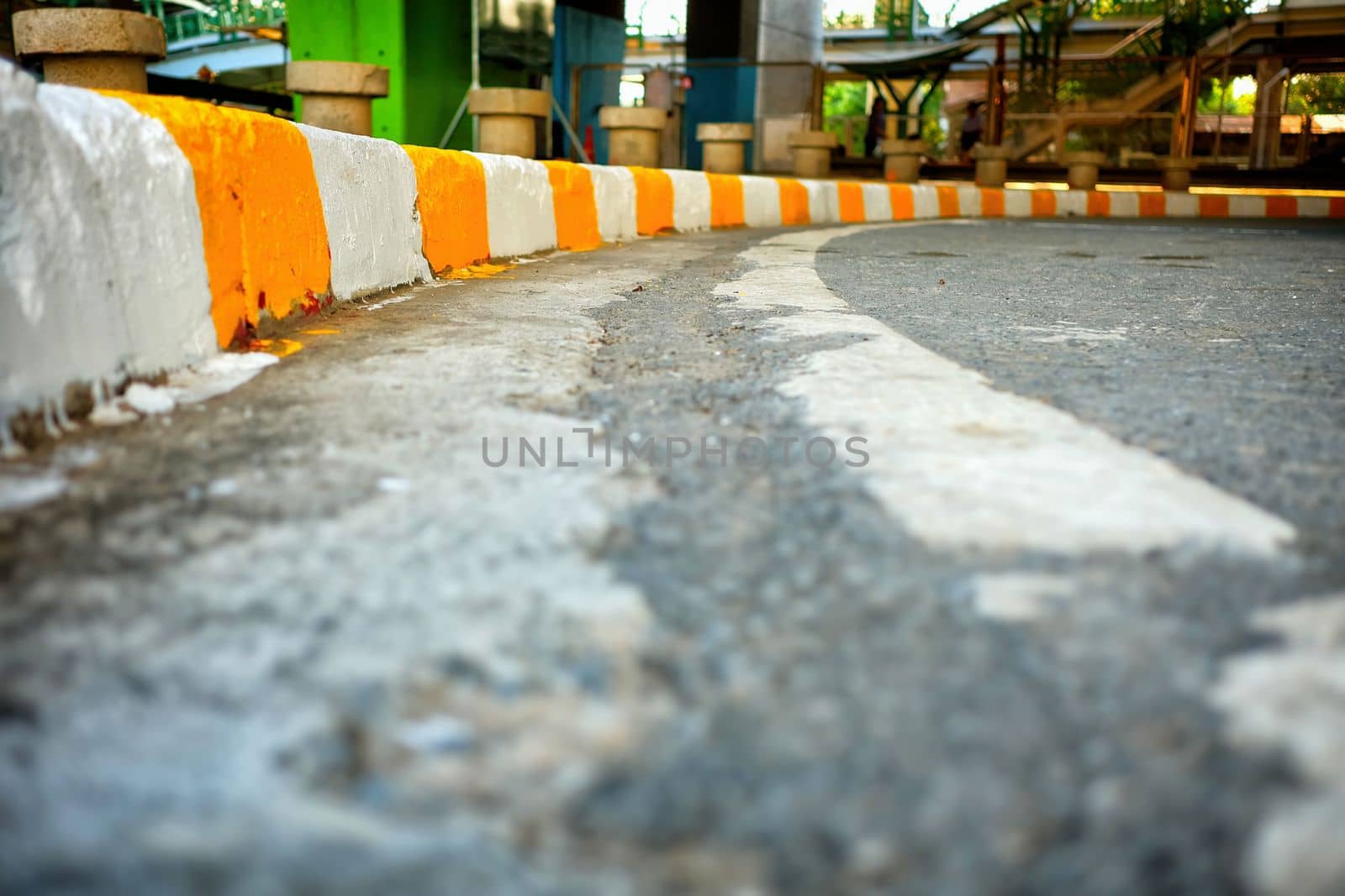 Bottom of Road, Selective Focus on White and Yellow Footpath.