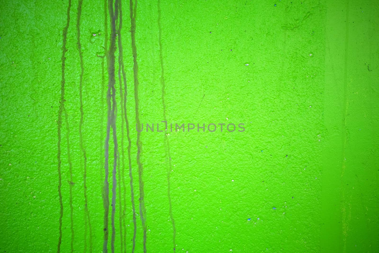 Water Stain on Green Painted Concrete Wall Texture Background. by mesamong
