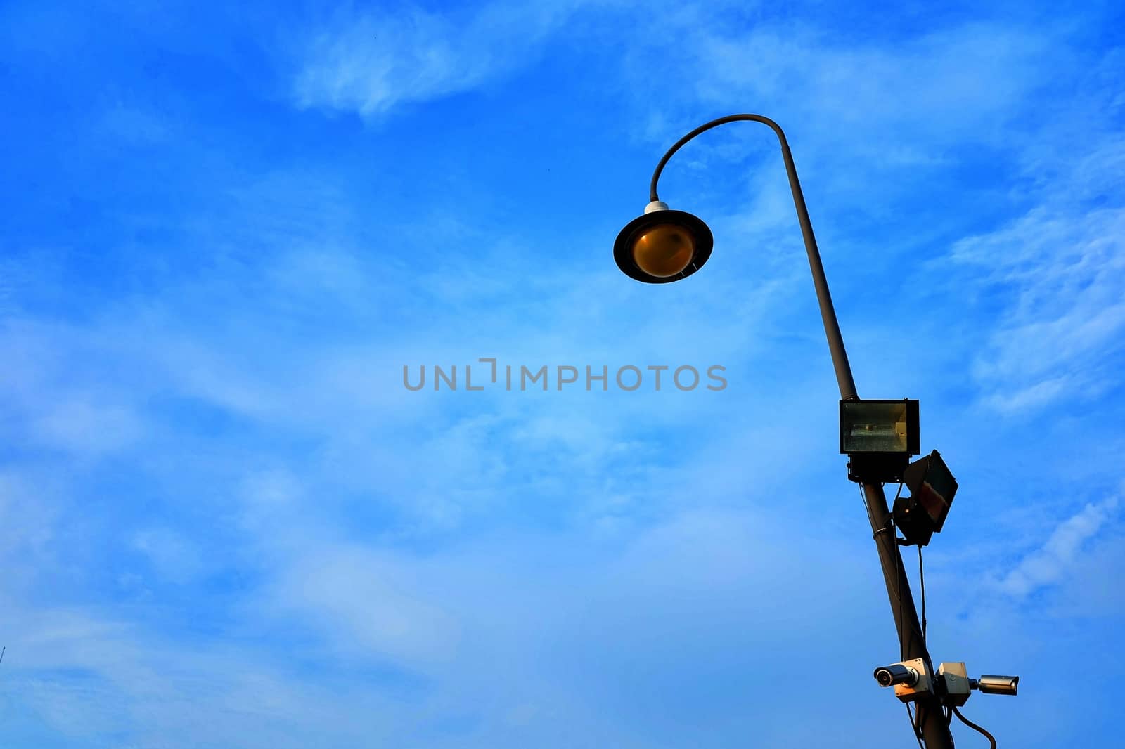Street Lamp Pole with Blue Sky Background.