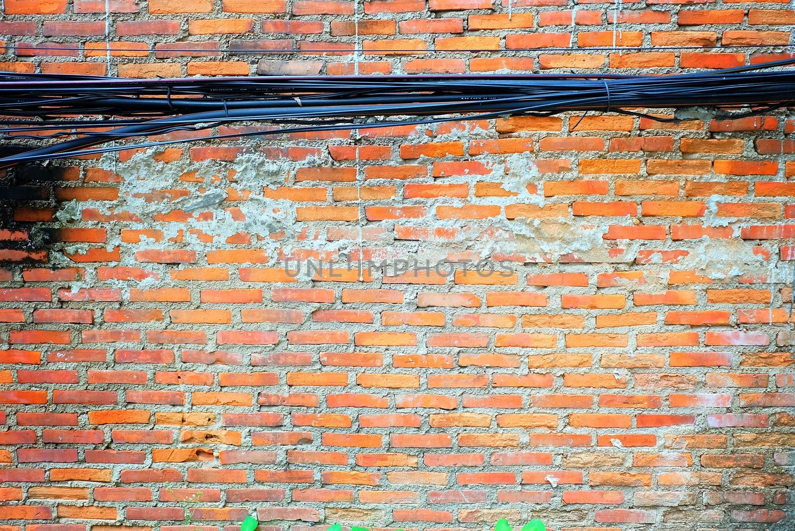 Messy Electrical Wires with Broken Old Brick Wall. by mesamong
