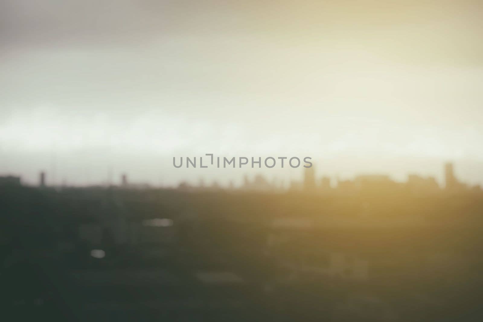 Blurred Cityscape with Light Leak Background.