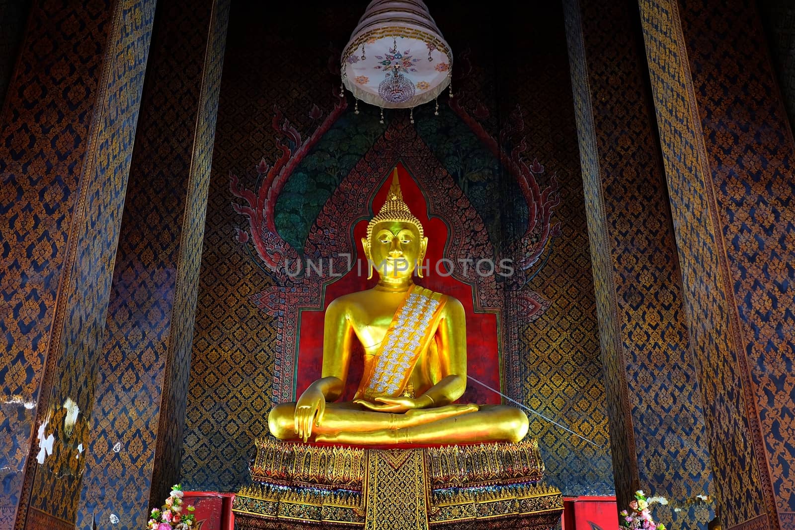 Ancient Golden Buddha image in main hall at Wat Intharam Temple Bangkok Thailand. by mesamong
