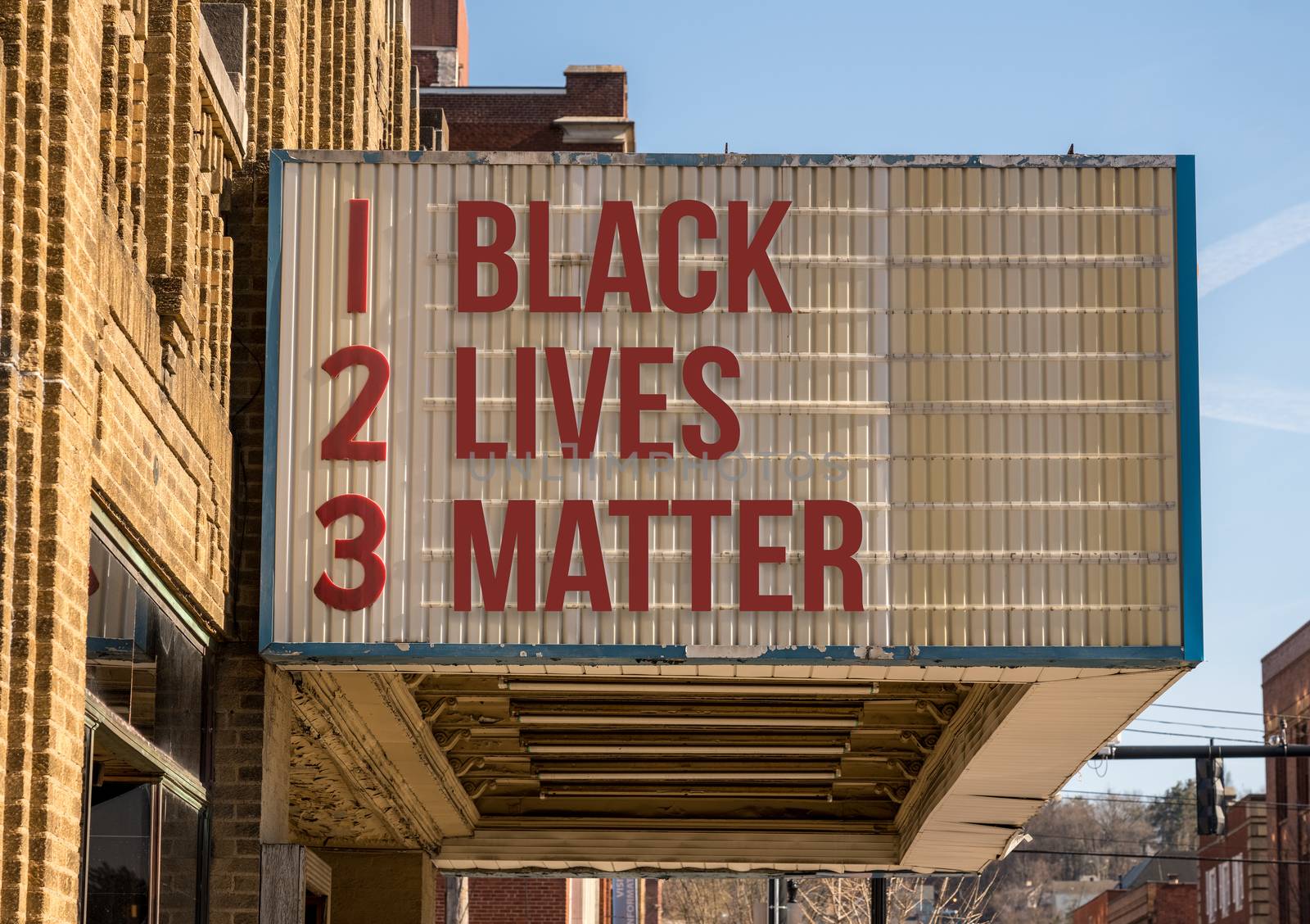 Mockup of movie cinema billboard with Black Lives Matter on the message board by steheap