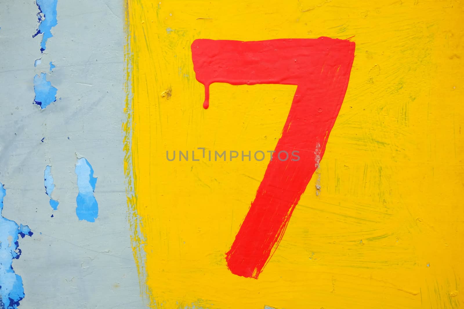 Red Seven Number Painting on Wall Background.