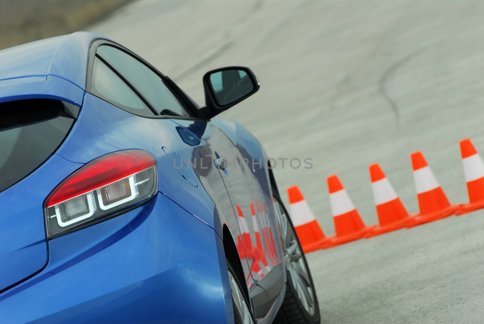 sports car on a test track with cones