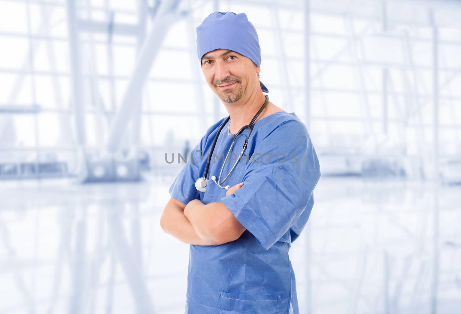 happy male doctor, at the hospital