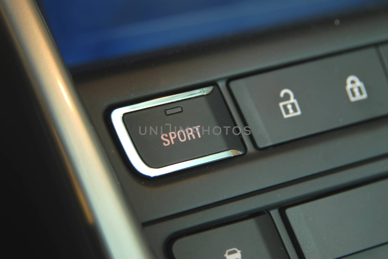sport button on the dashboard of the car