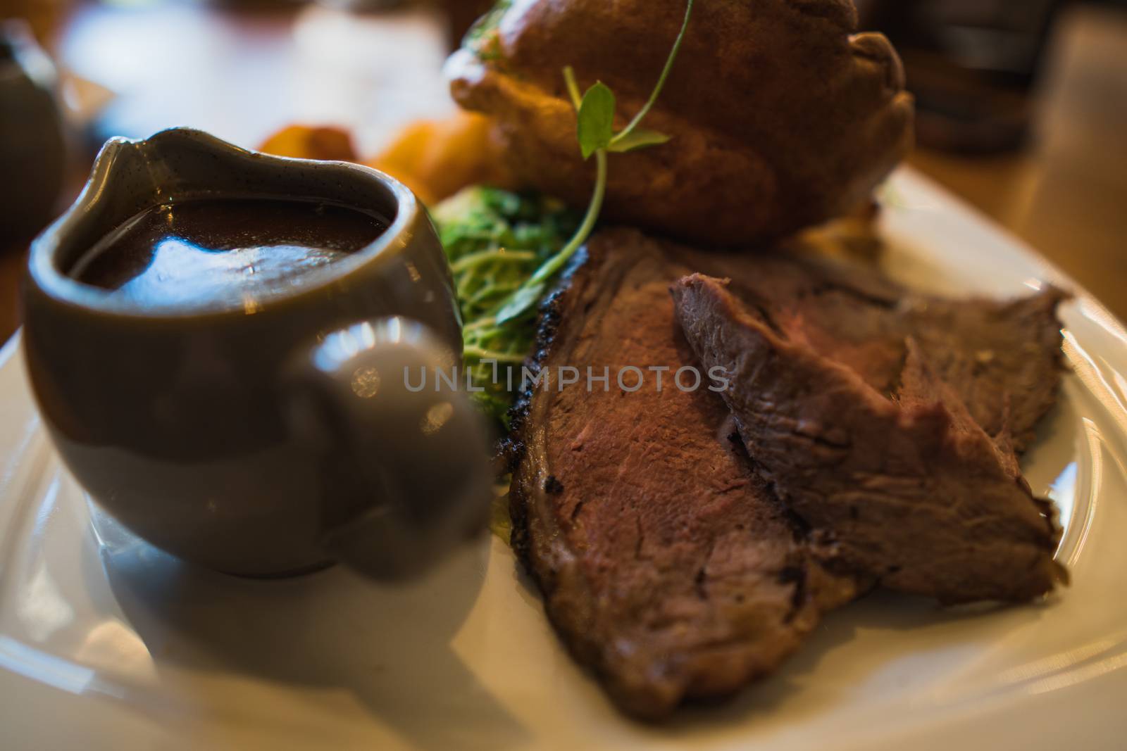 A sunday roast beef dinner in a restaurant