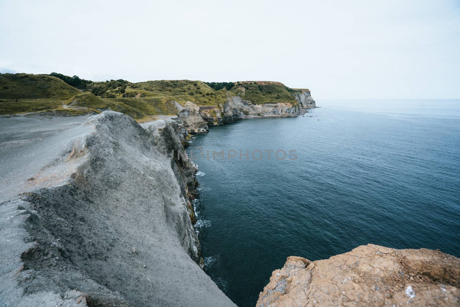 A British coastline during spring on a cliff top edge looking at the sea