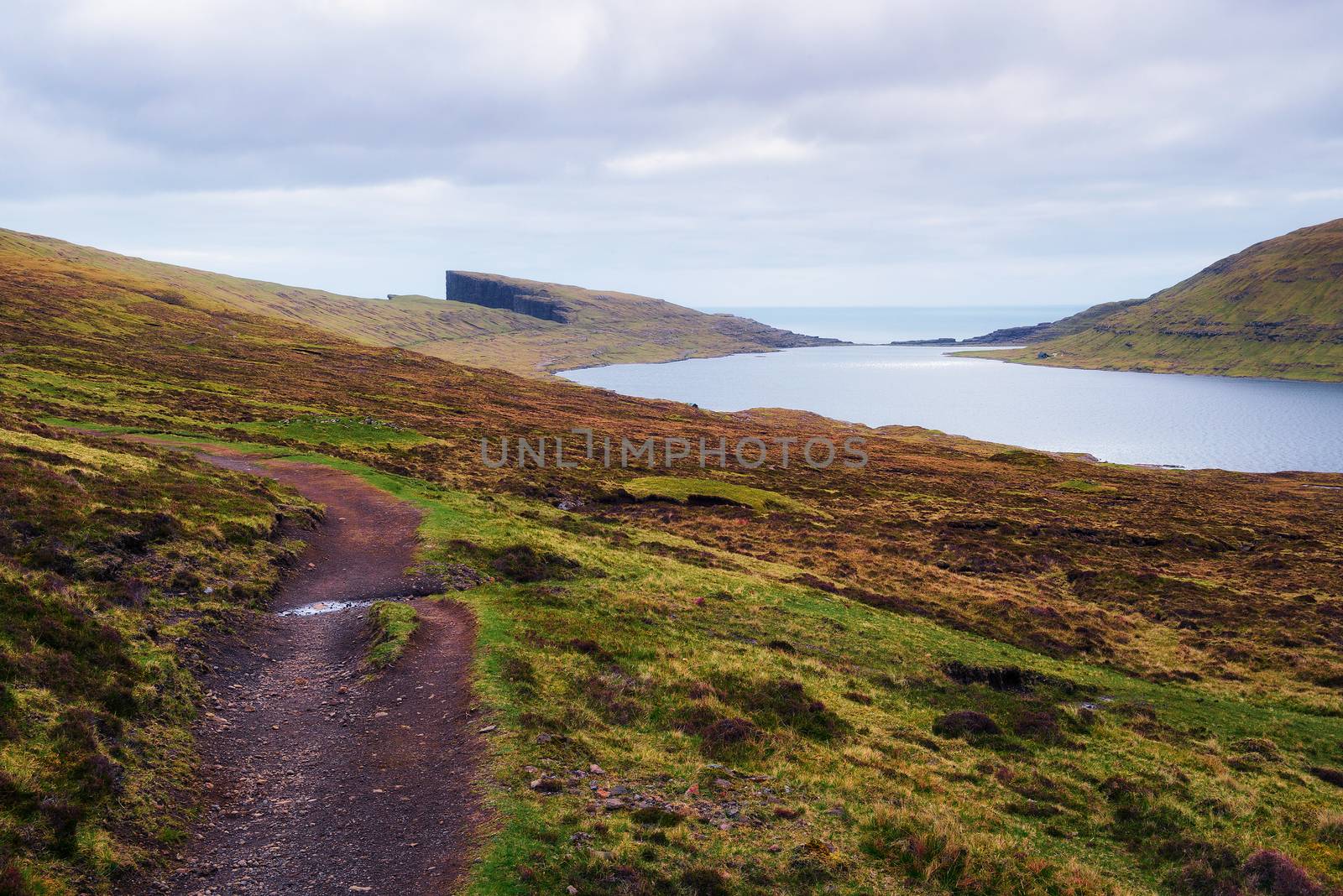 Footpath to cliff Traelanipan and lake Sorvagsvatn located on the island of Vagar. Leitisvatn or Sorvagsvatn is the largest lake in the Faroe Islands, Denmark.