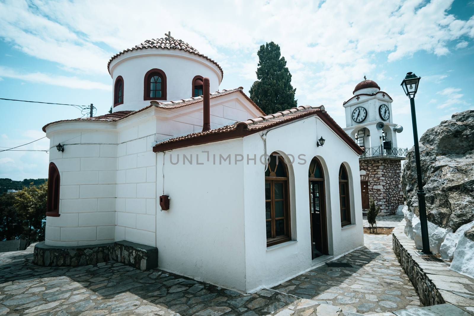 A traditional white painted church in Greece