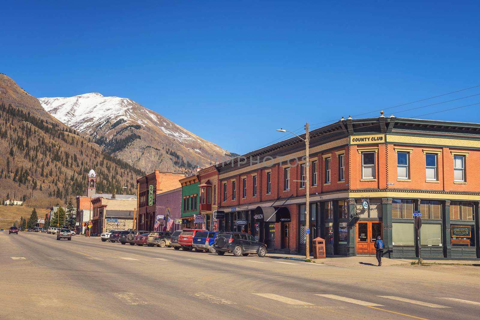Silverton, Colorado, USA - October 15, 2018 : Silverton Historic District with snow on the mountains behind. Silverton was a silver mining camp and is a National Historic Landmark.