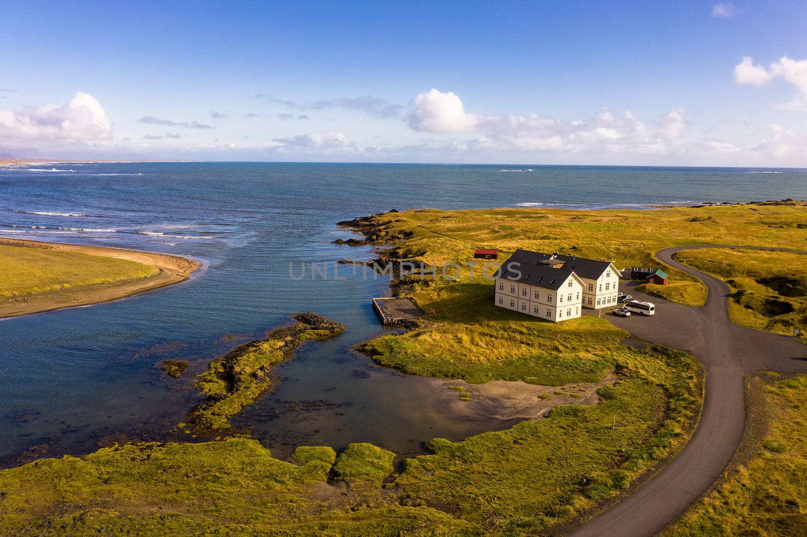 Budir, Iceland - September 8, 2019 : Aerial view of the luxury Hotel Budir at sunset located on the Snaefellsnes peninsula in west Iceland offering views over the Snaefellsjokull volcano and glacier.