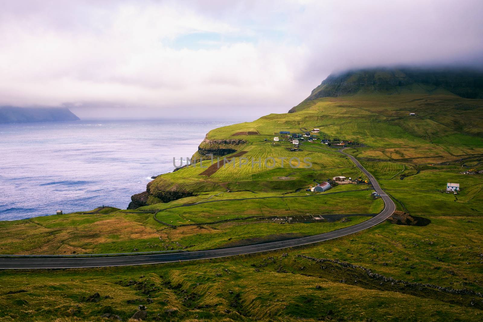 Road going to Gasadalur village in Faroe Islands by nickfox