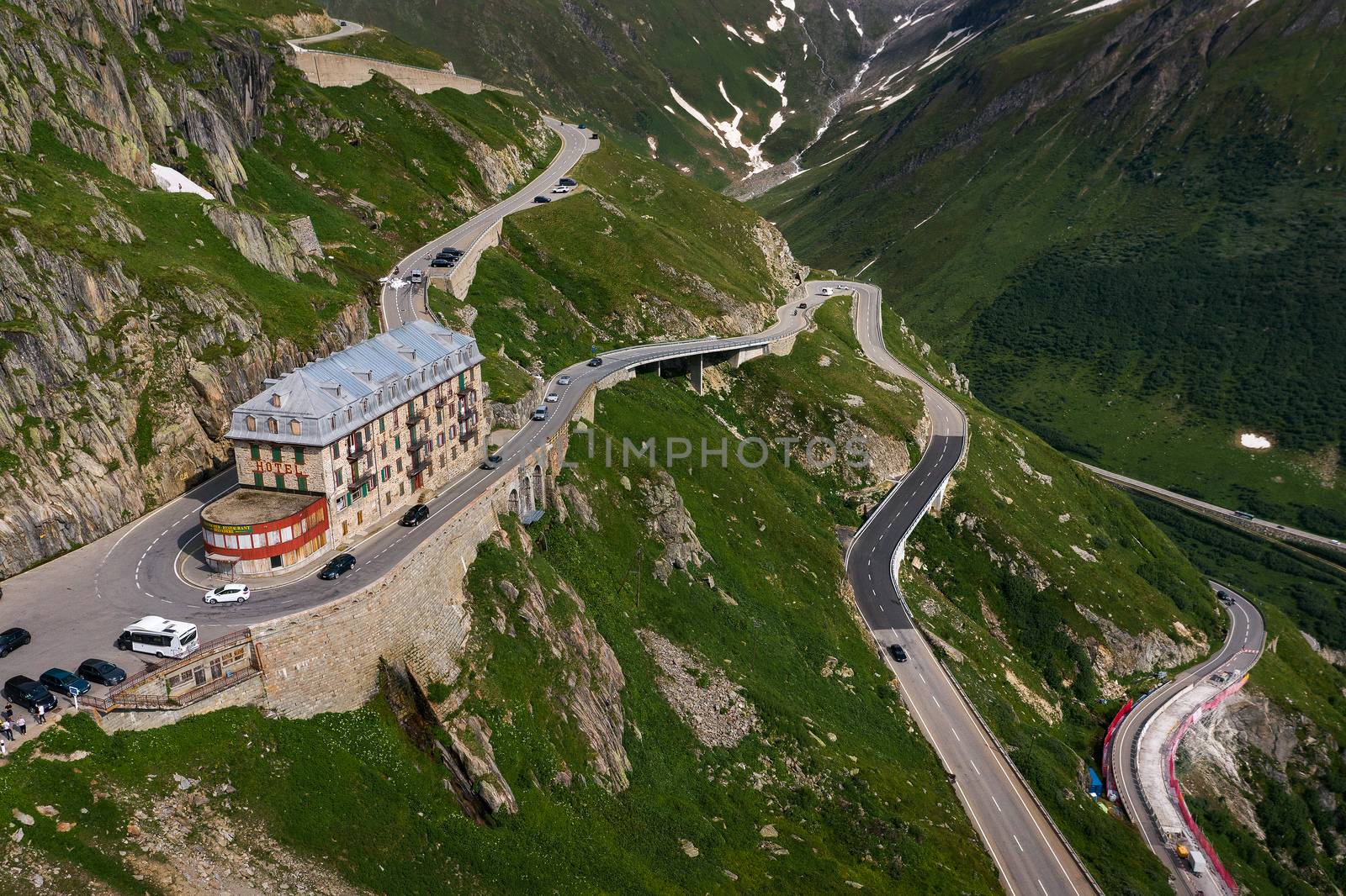 Furka Pass, Switzerland - July 21, 2019 : Aerial view of the closed mountain hotel Belvedere located near the Rhone Glacier at the Furka Pass.