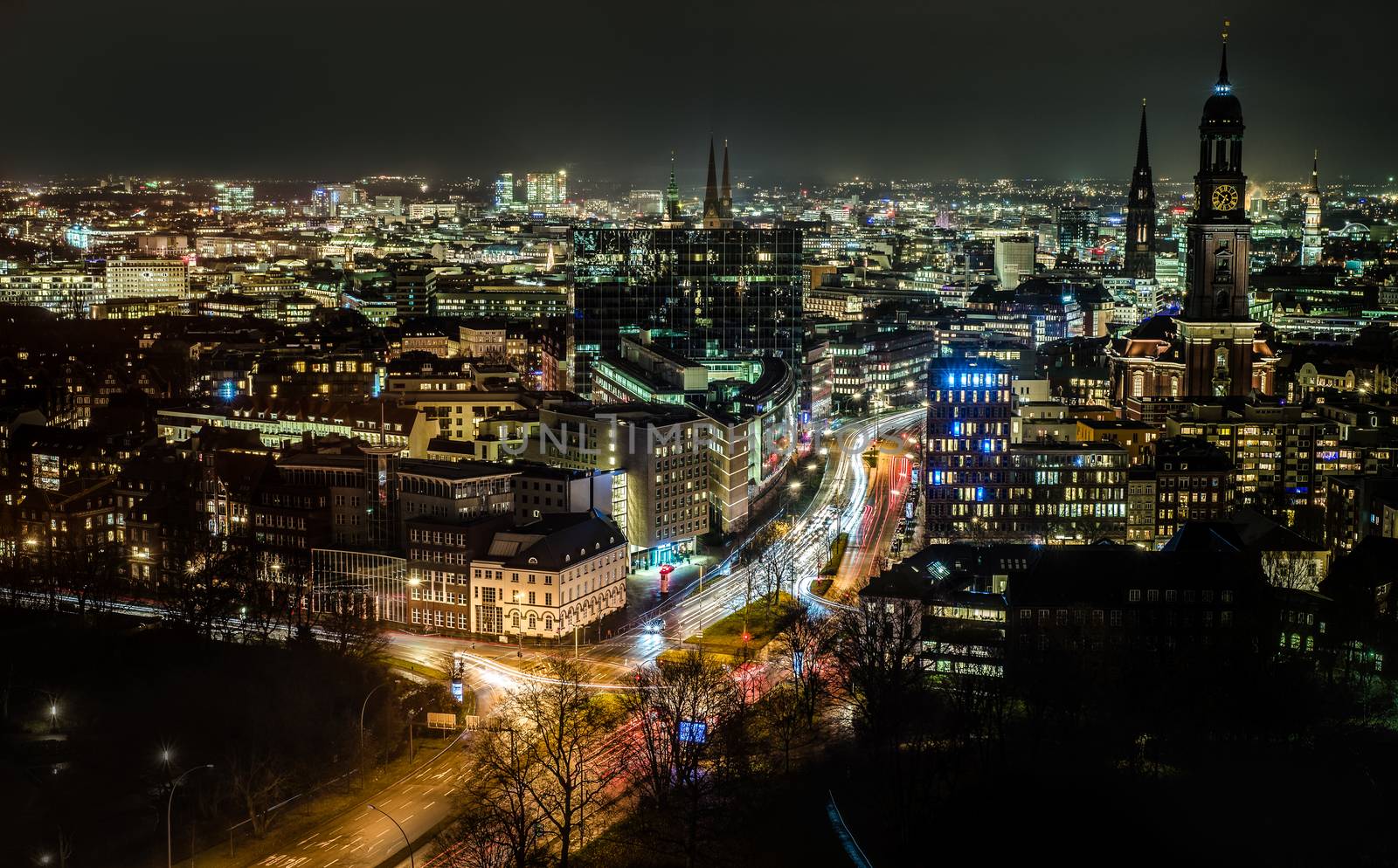 Hamburg cityscape by night featuring St. Michael's Church clock tower by Pendleton