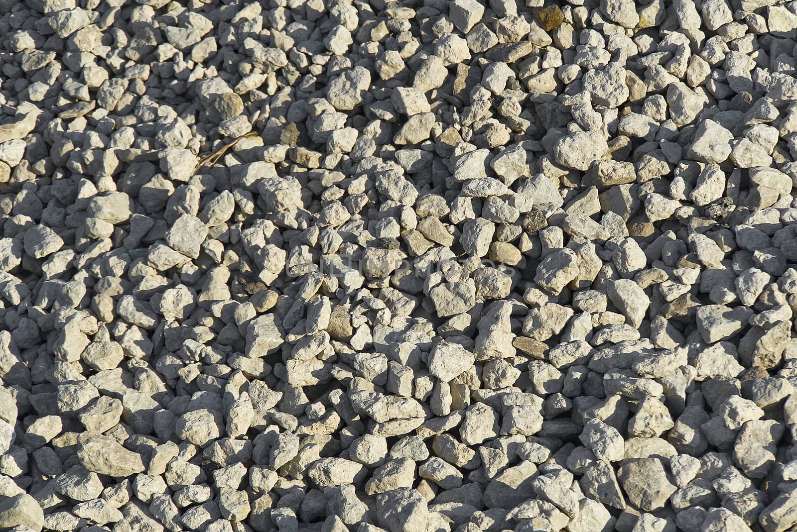 large crushed stone texture. Small pebble stones on construction site. gravel pebble stones background