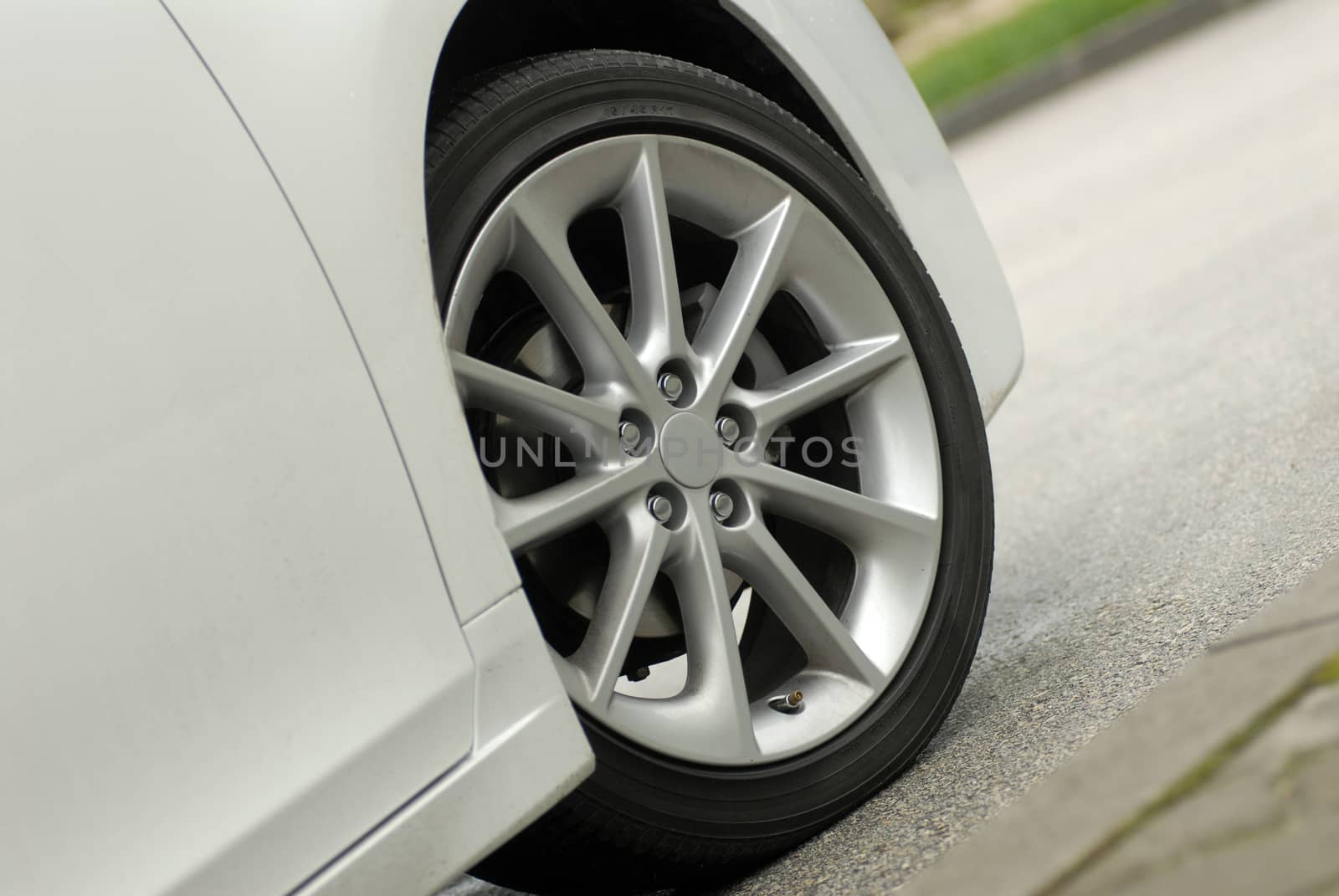 tire and alloy wheel on this passenger car by aselsa