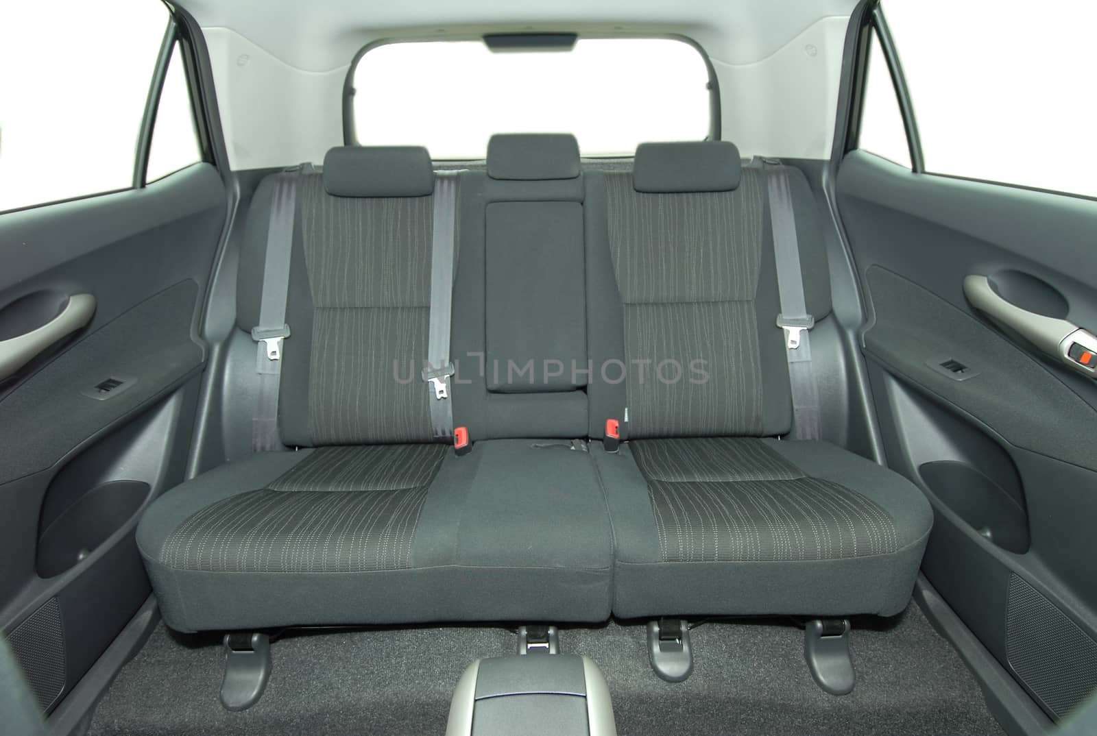 car interior, black leather rear seat in the passenger car