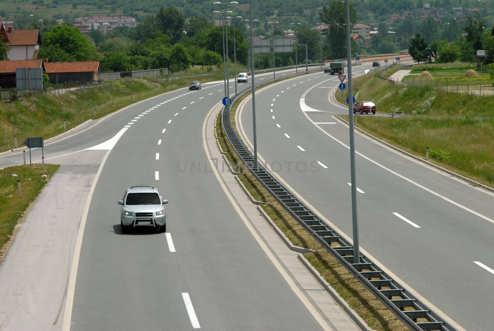 curve on the highway with cars