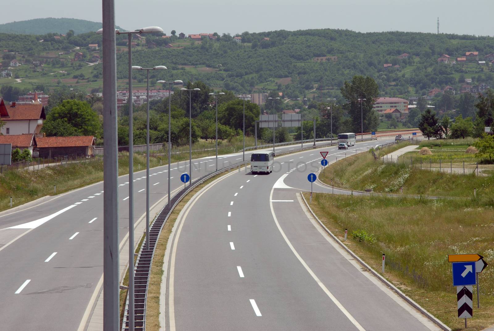 curve on the highway with cars