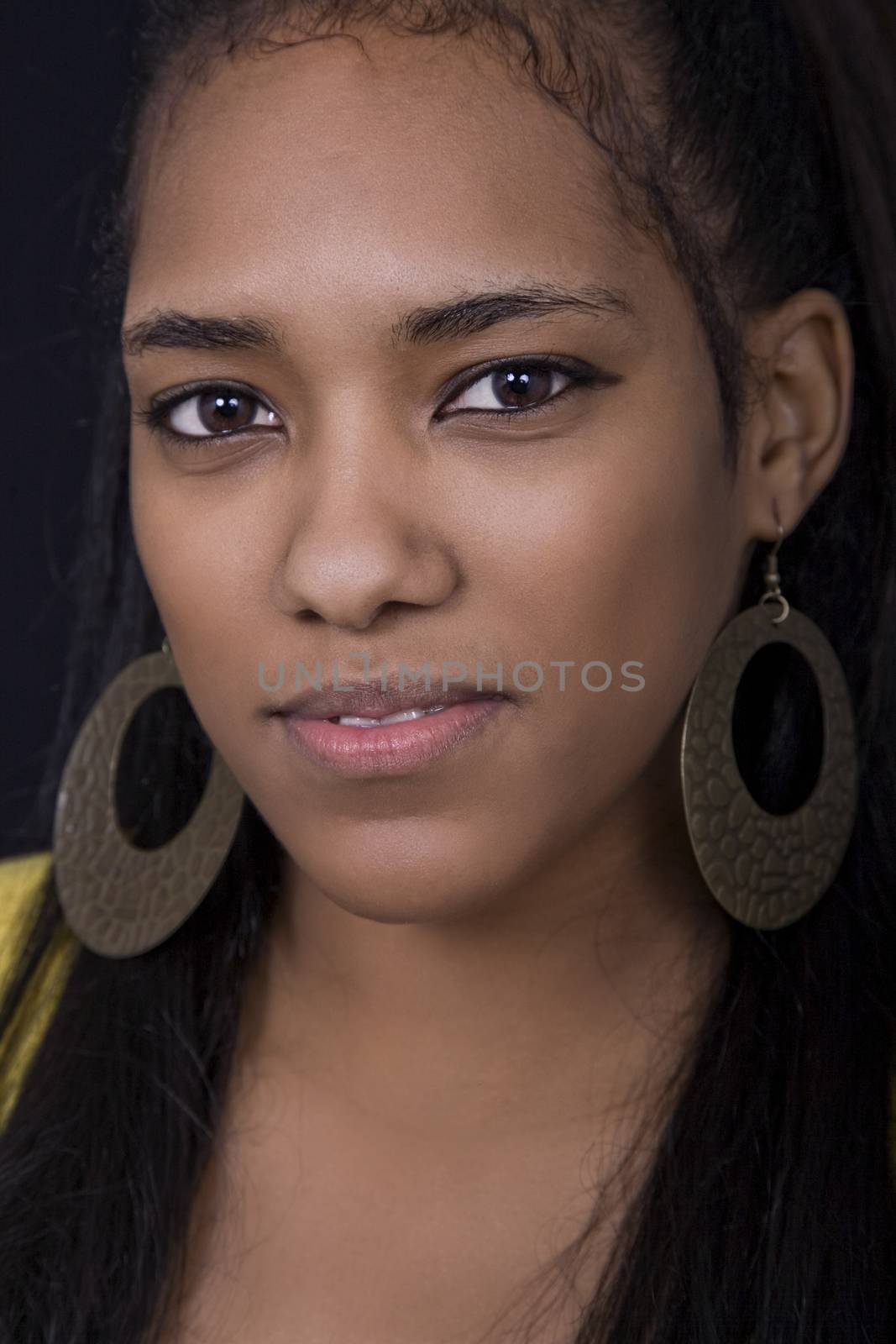 Happy african girl close up portrait, studio picture