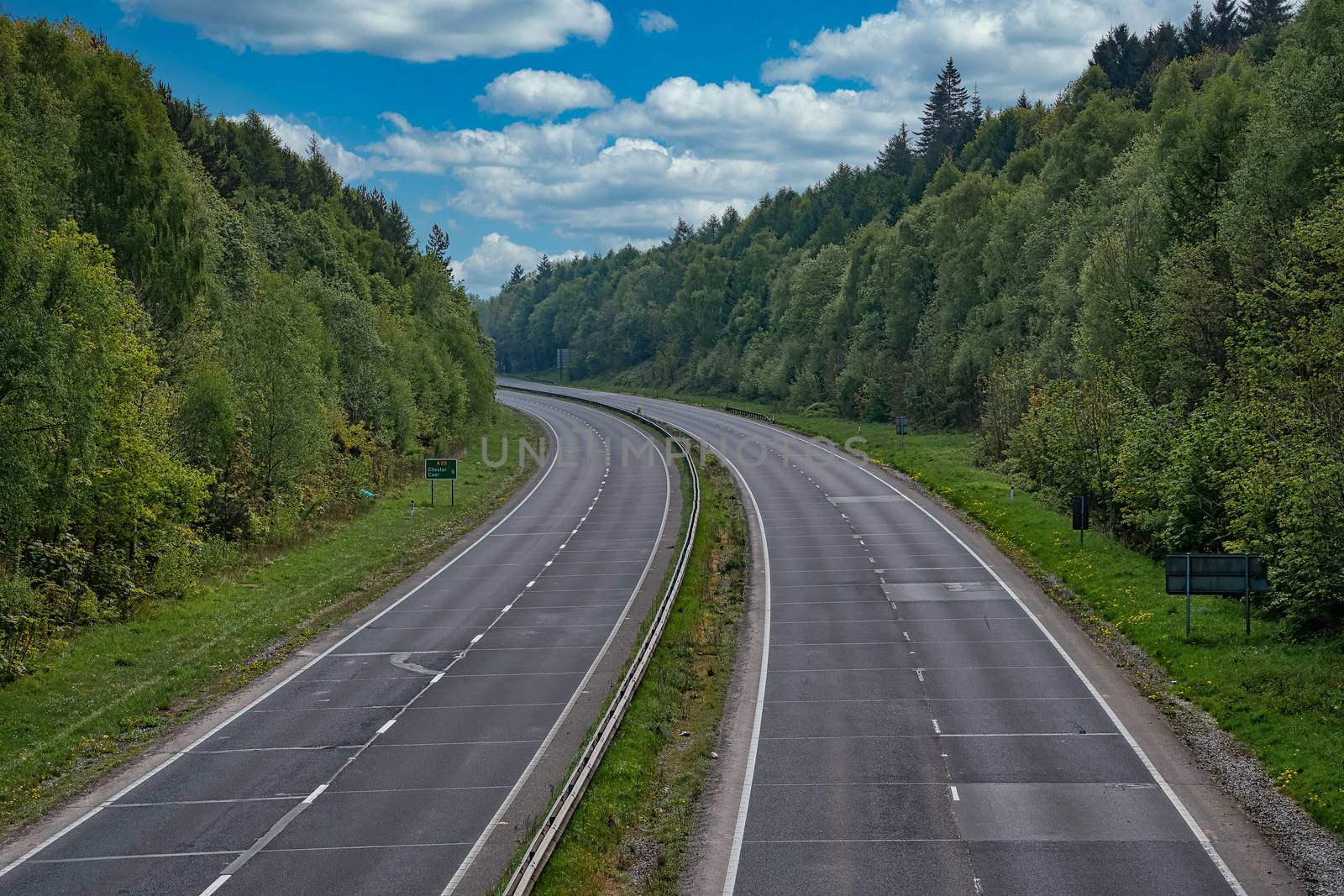 A deserted normally busy main road. The A55 is the main route from England to North Wales, normally full of traffic