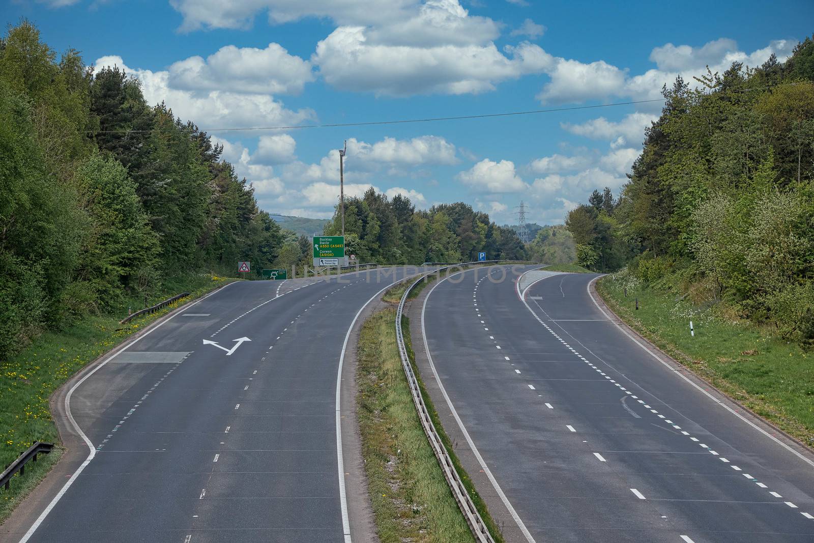 A deserted normally busy main road. The A55 is the main route from England to North Wales, normally full of traffic