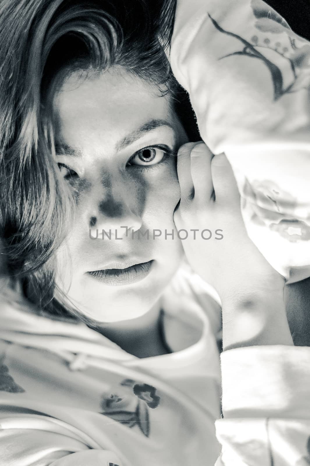 bw portrait of a young brunette woman with very beautiful big eyes