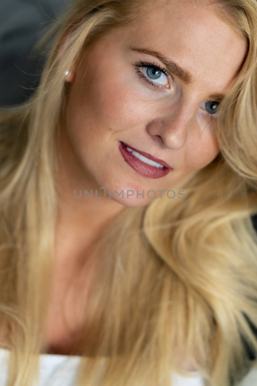 A gorgeous blonde model enjoys a day at home before work