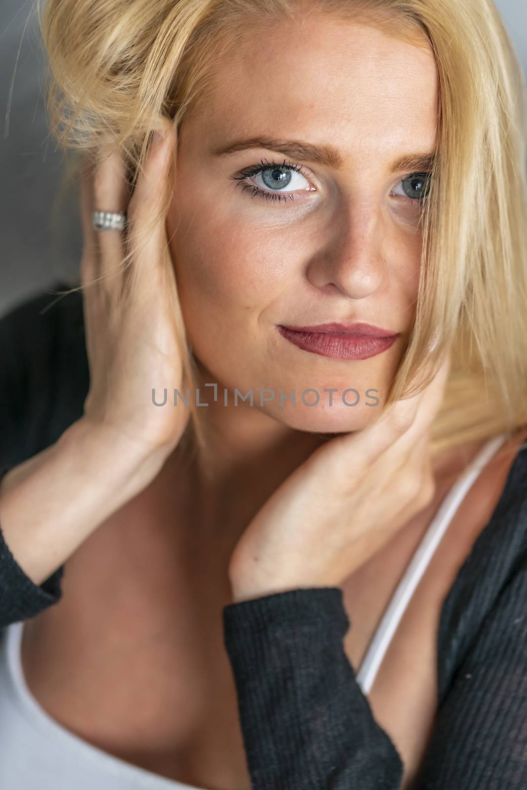A gorgeous blonde model enjoys a day at home before work