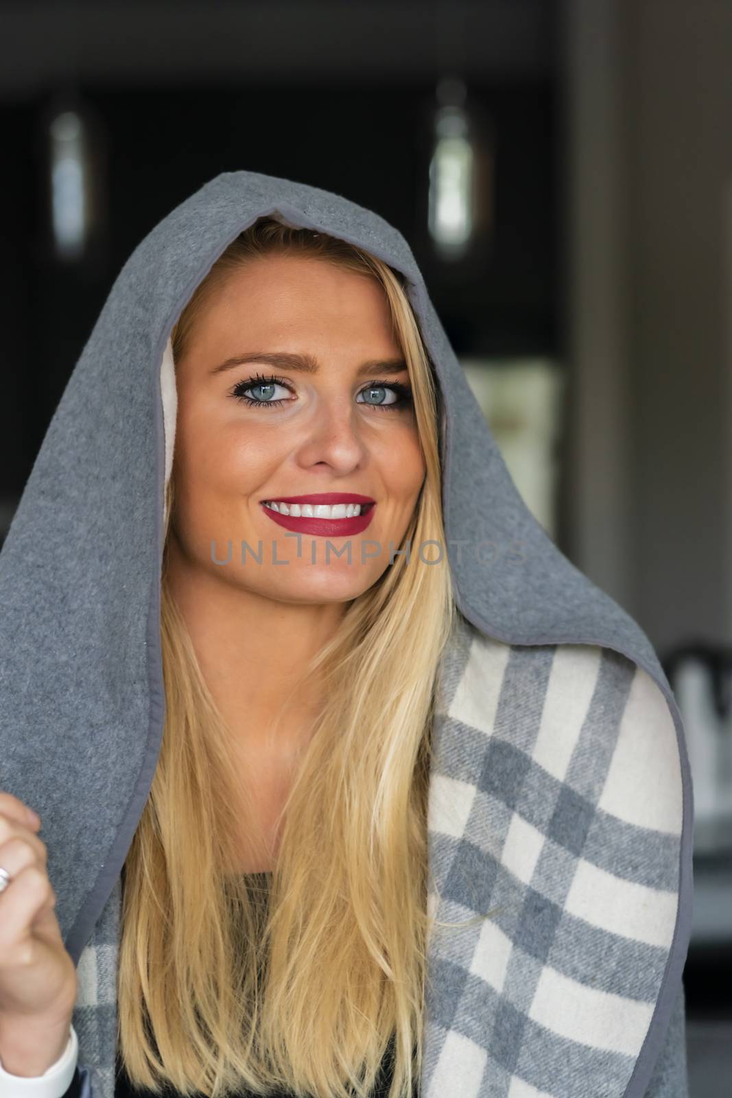 A gorgeous blonde model enjoys a day at home before work
