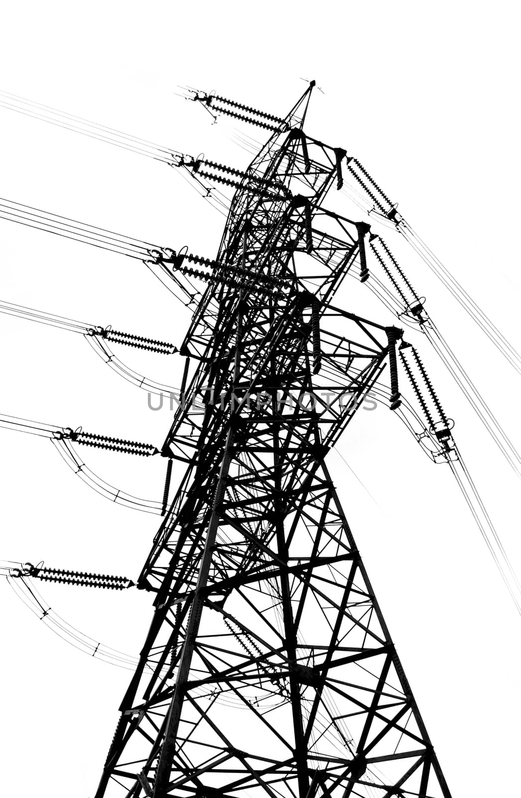 A large electricity transmission pylon seen in outline
