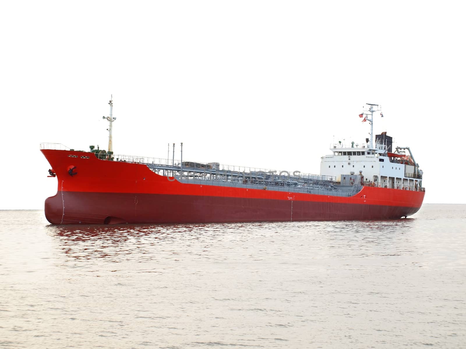 A commercial petroleum bulk transport ship against a white background
