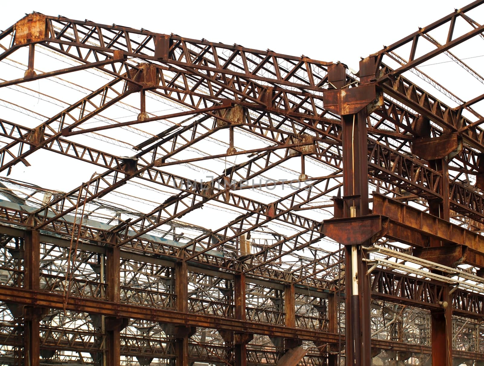 Ruins of old factory buildings that are turning into rust