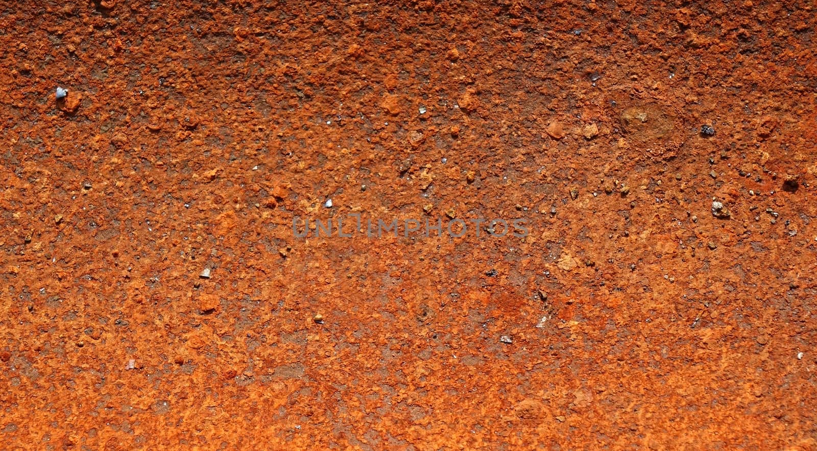 Background texture of a heavily corroded and rusted piece of scrap metal