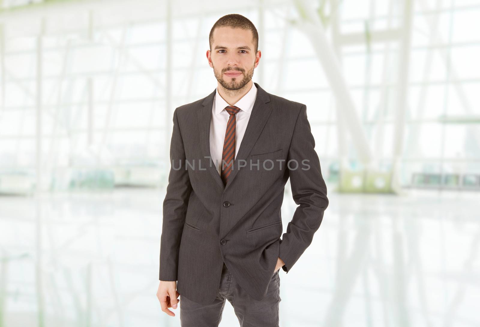 happy business man portrait at the office