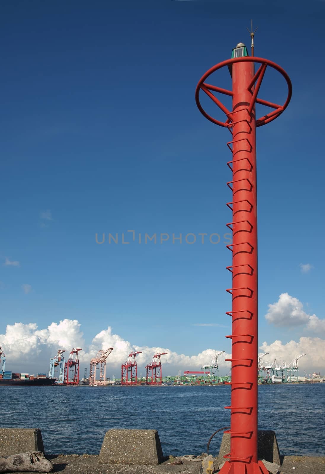 A small light tower at Kaohsiung Port container loading facility