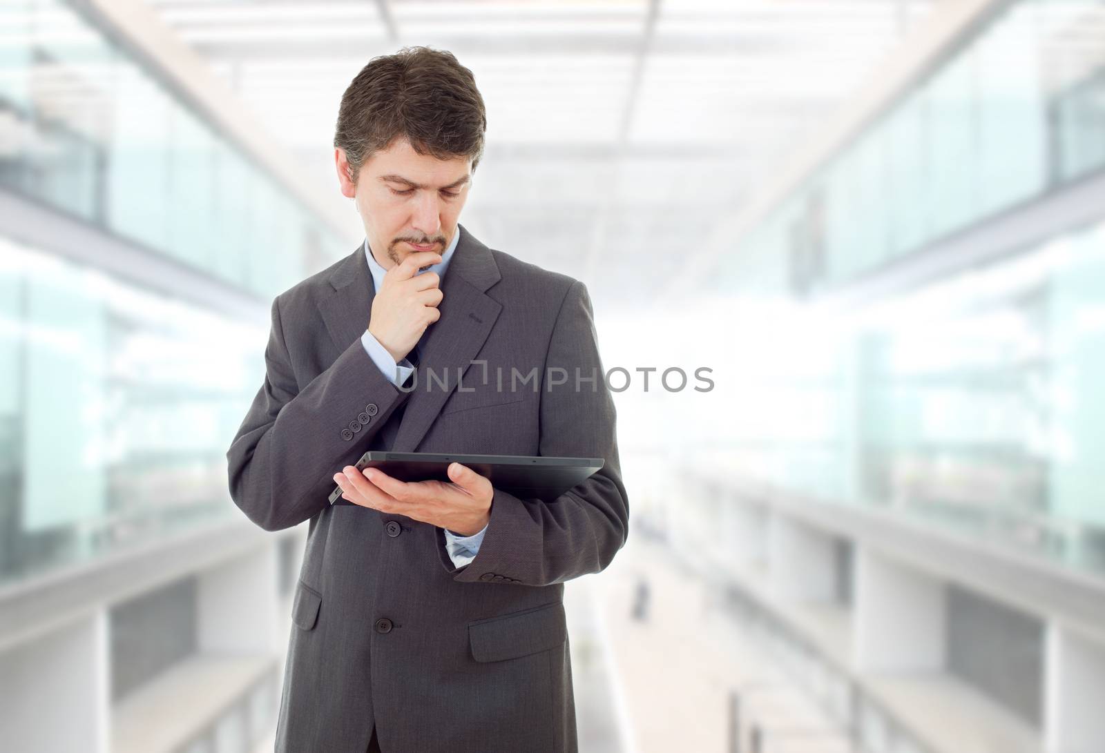 businessman working with a tablet pc, at the office