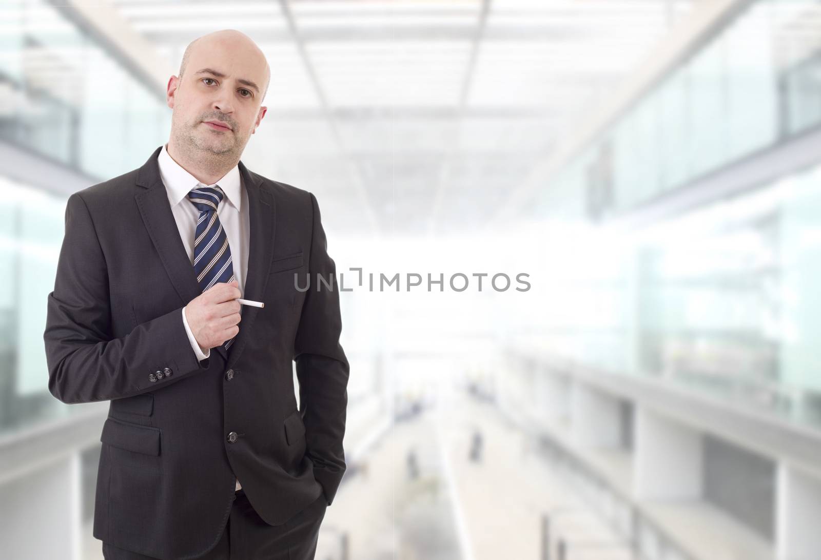 businessman smoking at the office