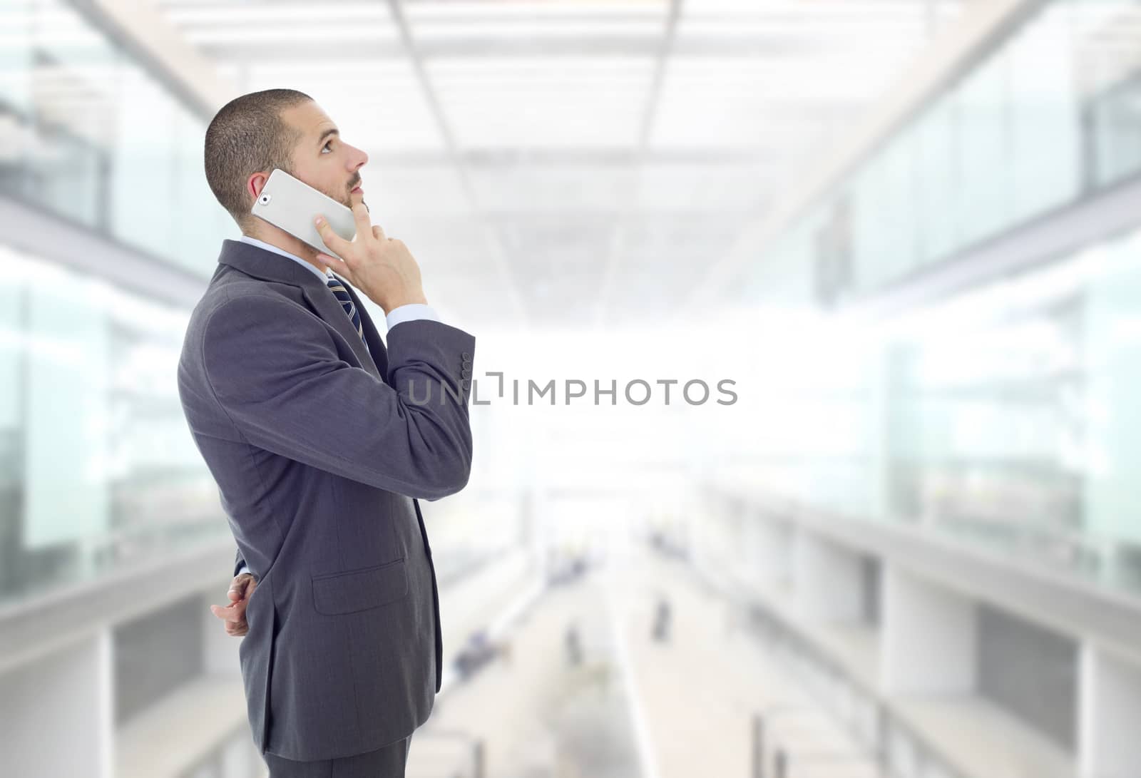 worried business man on the phone, at the office